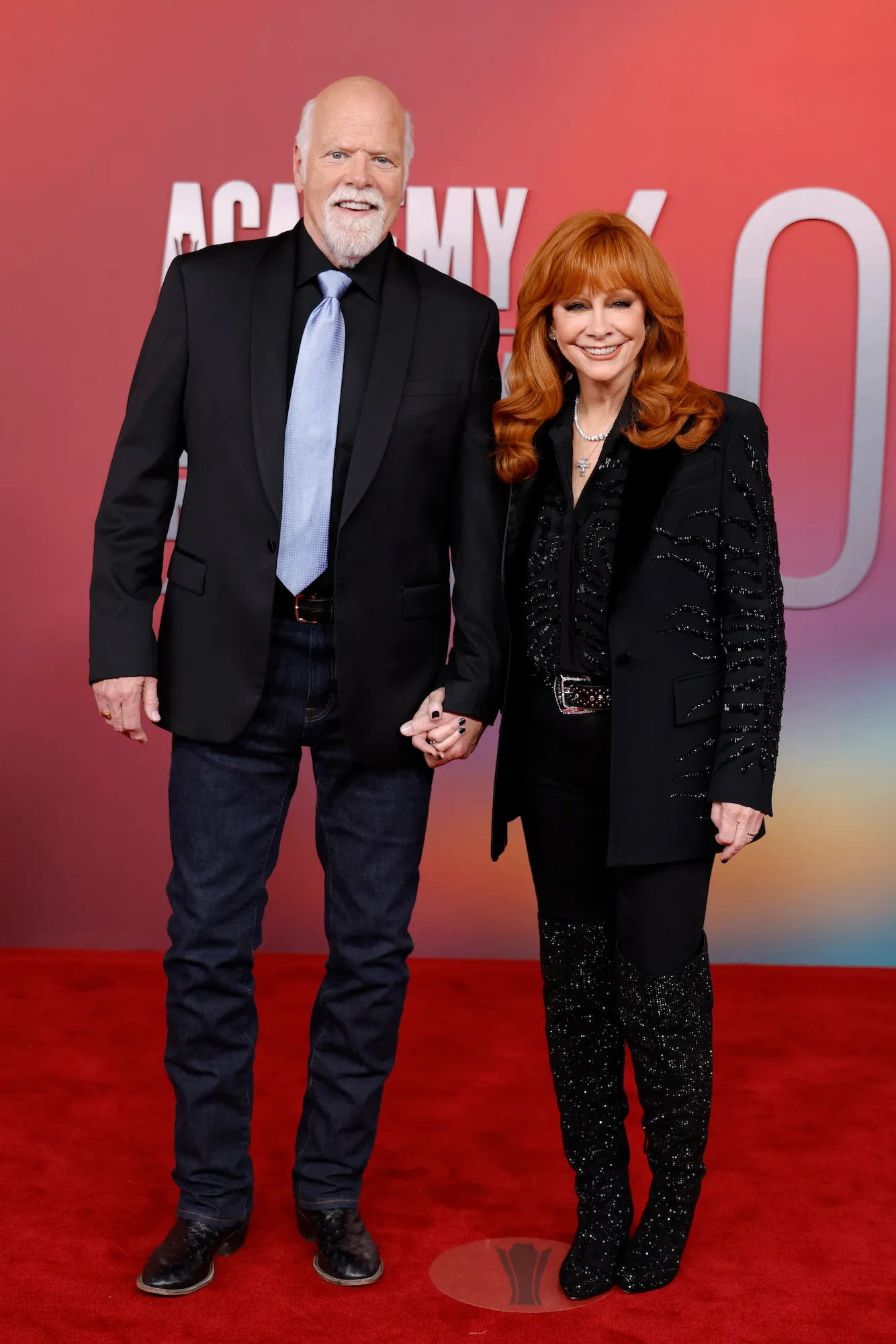 GettyImages-2214126600.Reba McEntire Rex Linn ACMs Red Carpet