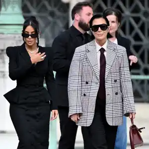 Kim Kardashian Drips in Diamonds and Feathers During Paris Trial