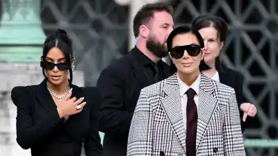 Kim Kardashian Drips in Diamonds and Feathers During Paris Trial