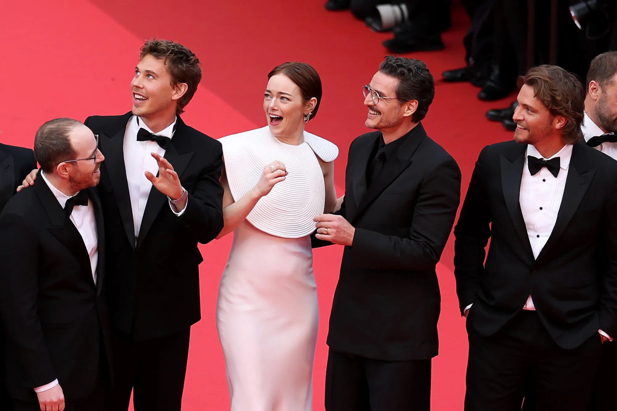 GettyImages-2215444653 Emma Stone and Pedro Pascal Cower From a Bee While on the Cannes Red Carpet.