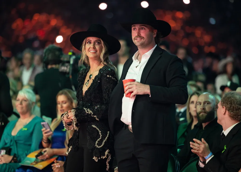 Lainey Wilson Wins Female of the Year at 2025 ACM Awards Celebrates With Duck Hodges