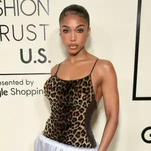 Lori Harvey Shows Off Her Rock Hard Abs in Sleek Alo Gear