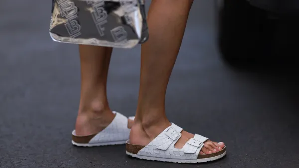 BERLIN, GERMANY - AUGUST 06: Anna Winter wearing Birkenstock white sandals, by Far silver shiny logo bag on August 06, 2022 in Berlin, Germany. (Photo by Jeremy Moeller/Getty Images)