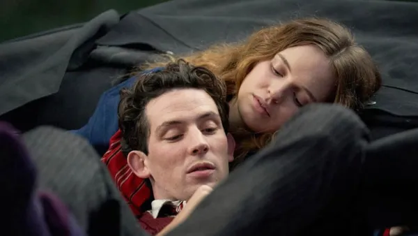 A woman looks at a man in 'Mothering Sunday.'