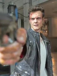 A man aims his gun in 'Novocaine.'