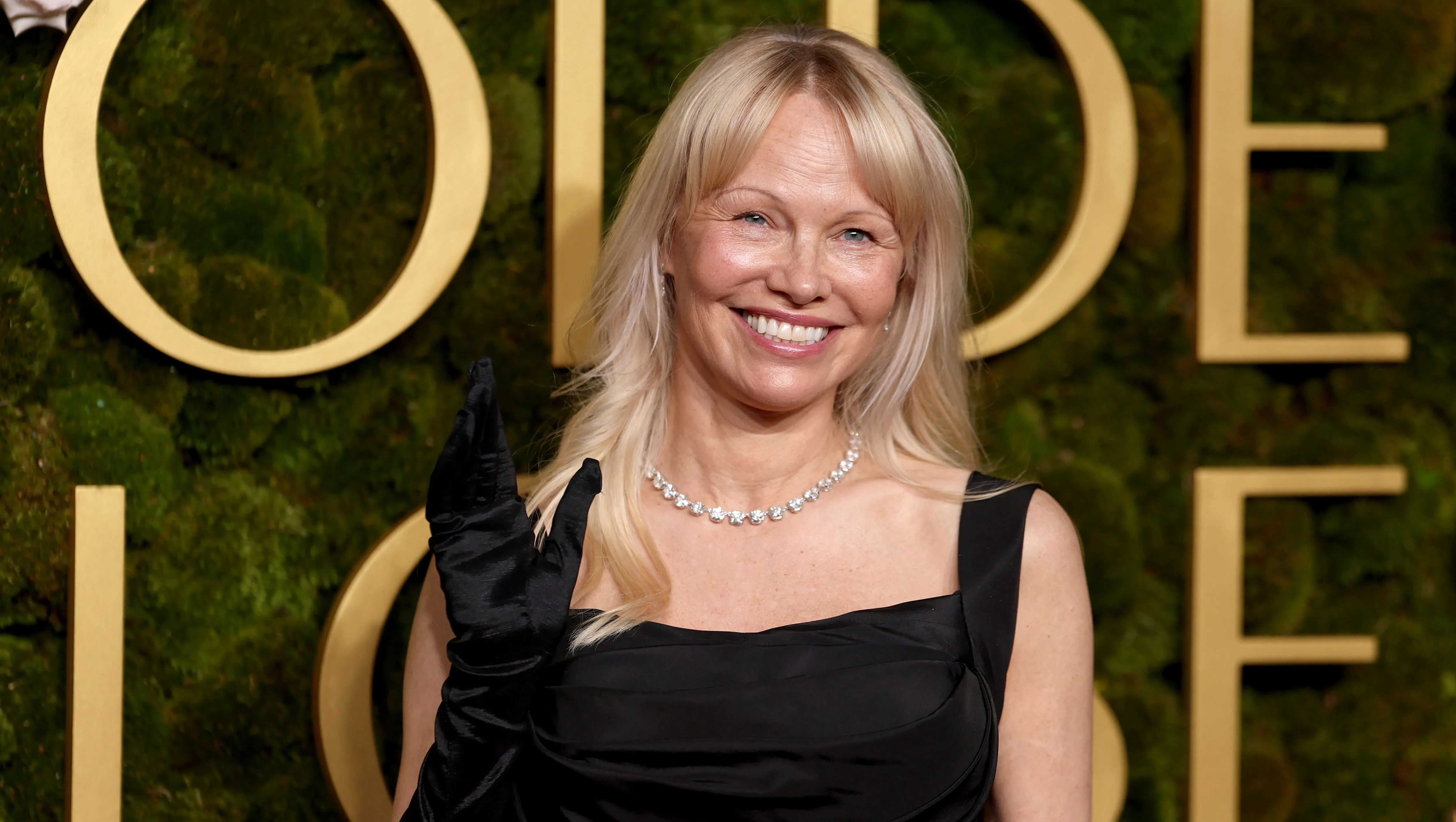 BEVERLY HILLS, CALIFORNIA - JANUARY 05: Pamela Anderson attends the 82nd Annual Golden Globe Awards at The Beverly Hilton on January 05, 2025 in Beverly Hills, California. (Photo by Matt Winkelmeyer/WireImage)