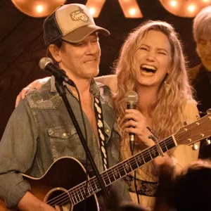 A man and a woman play music in 'The Bondsman.'