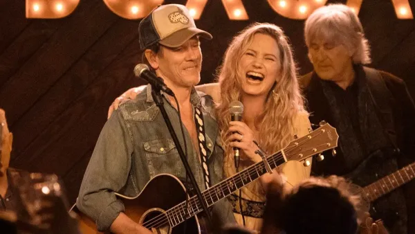 A man and a woman play music in 'The Bondsman.'