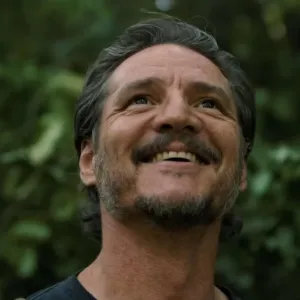 Pedro Pascal smiles in 'The Last of Us.'