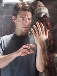 Tom Cruise looks at his hand in 'War of the Worlds.'