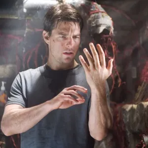 Tom Cruise looks at his hand in 'War of the Worlds.'