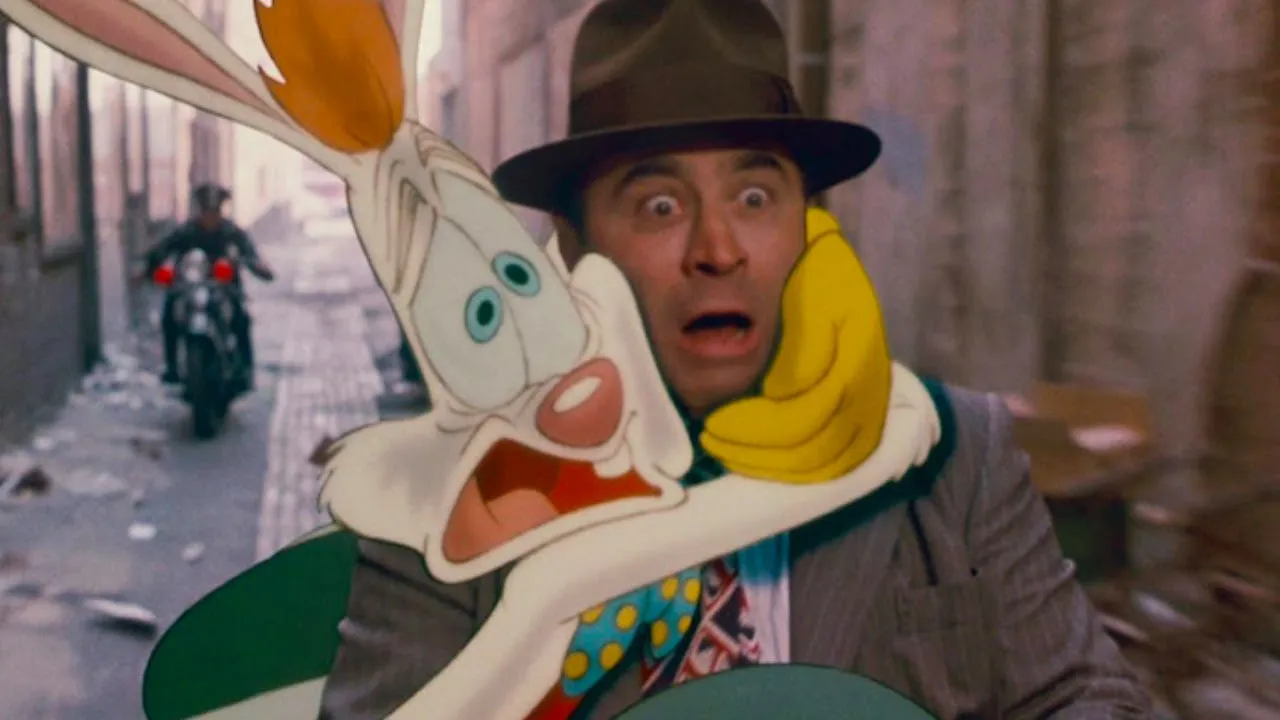 Roger Rabbit holds on to Eddie Valiant in a scene from 'Who Framed Roger Rabbit.'