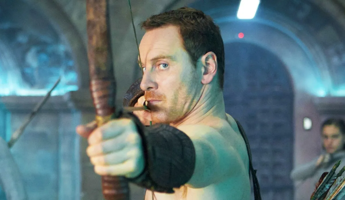 A man aims a bow and arrow in 'Assassin's Creed.'