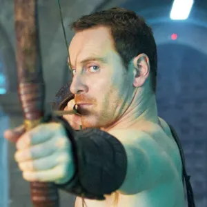 A man aims a bow and arrow in 'Assassin's Creed.'