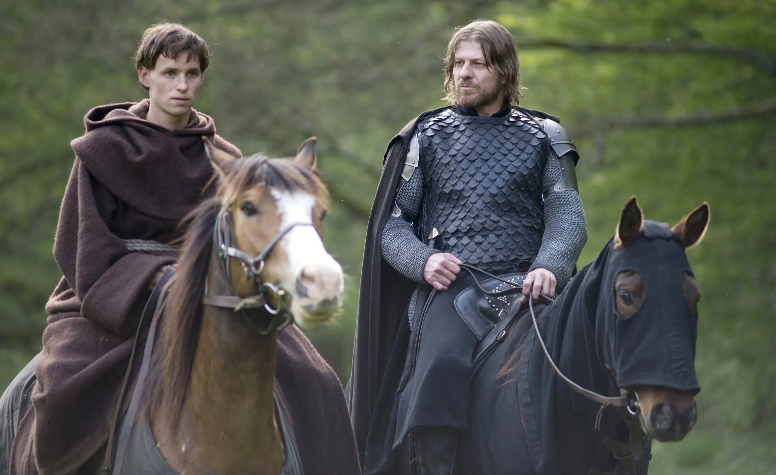 Two men ride horses in 'Black Death.'