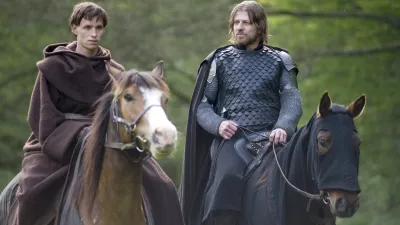 Two men ride horses in 'Black Death.'