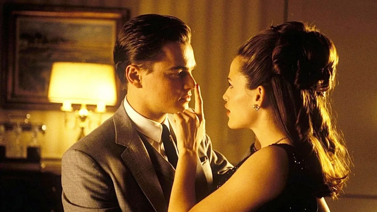 A woman touches a man's nose in 'Catch Me If You Can.'