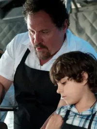 A father cooks with his son in 'Chef.'