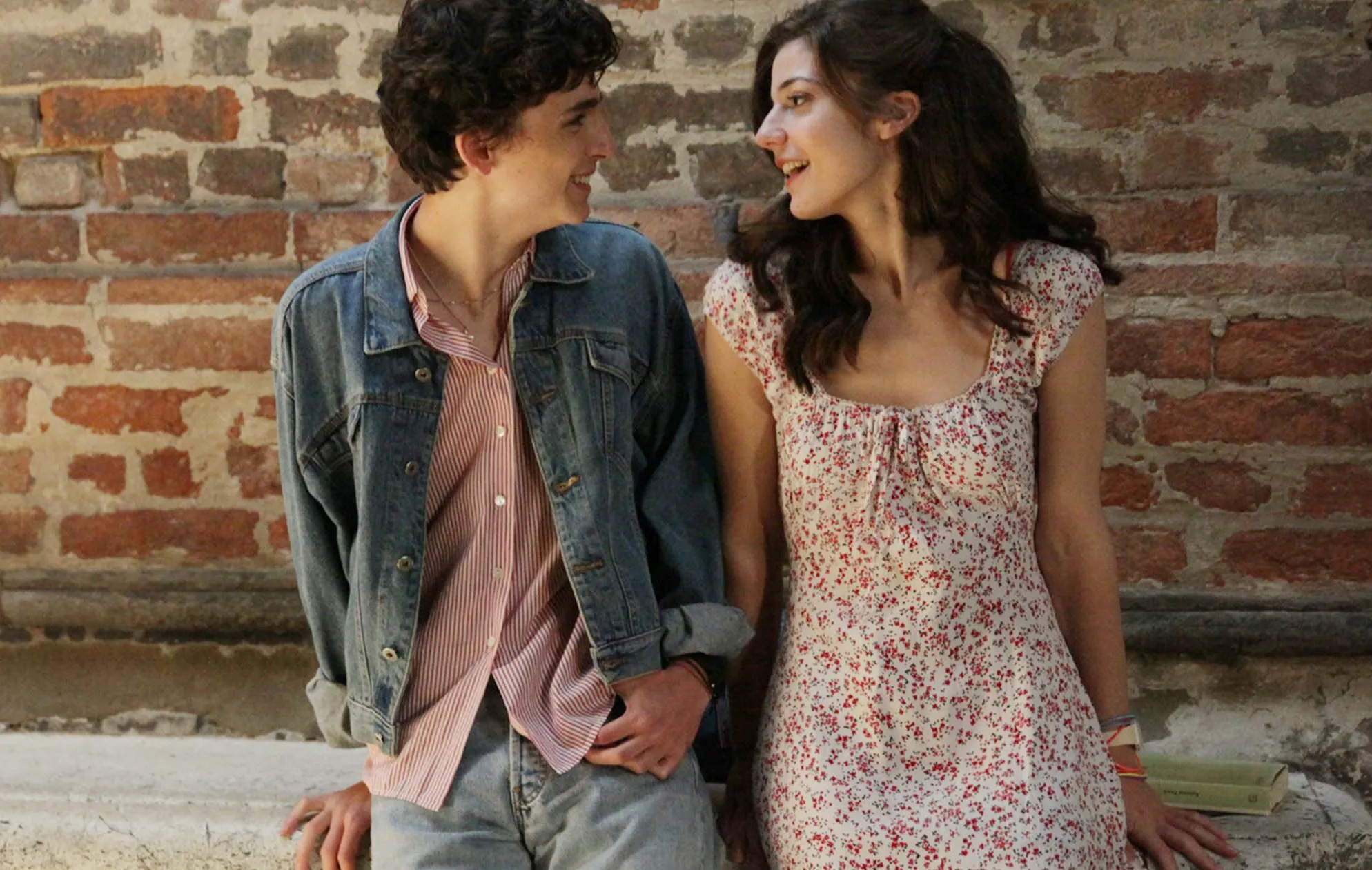 A boy talks to a girl in 'Call Me by Your Name.'