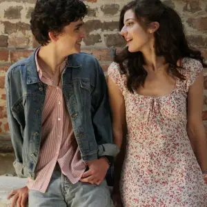 A boy talks to a girl in 'Call Me by Your Name.'