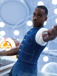 A man reaches for something in Doctor Who season 2.