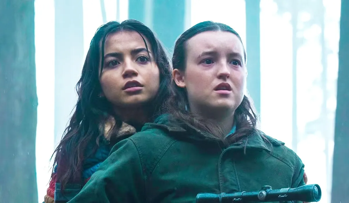 Ellie and Dina walk in the woods in 'The Last of Us' season 2.