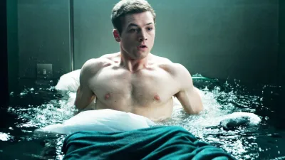 A man wakes up shirtless in 'Kingsman: The Secret Service.'