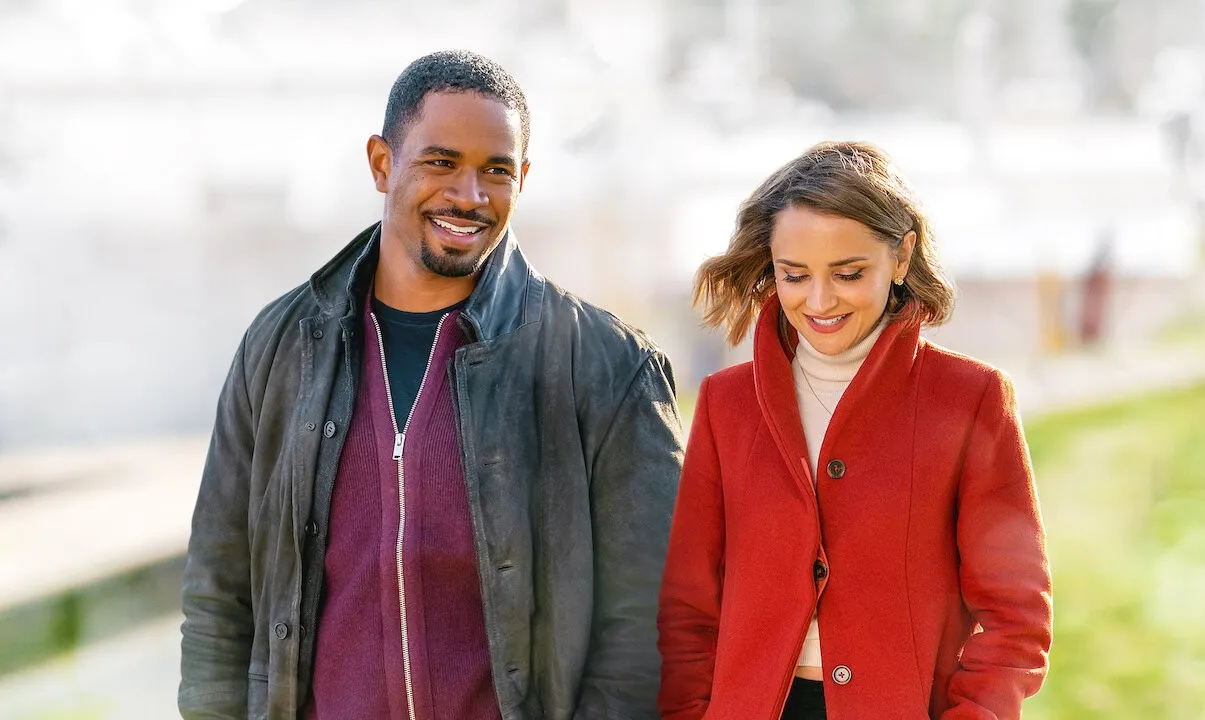 Two people walk in 'Love, Guaranteed.'