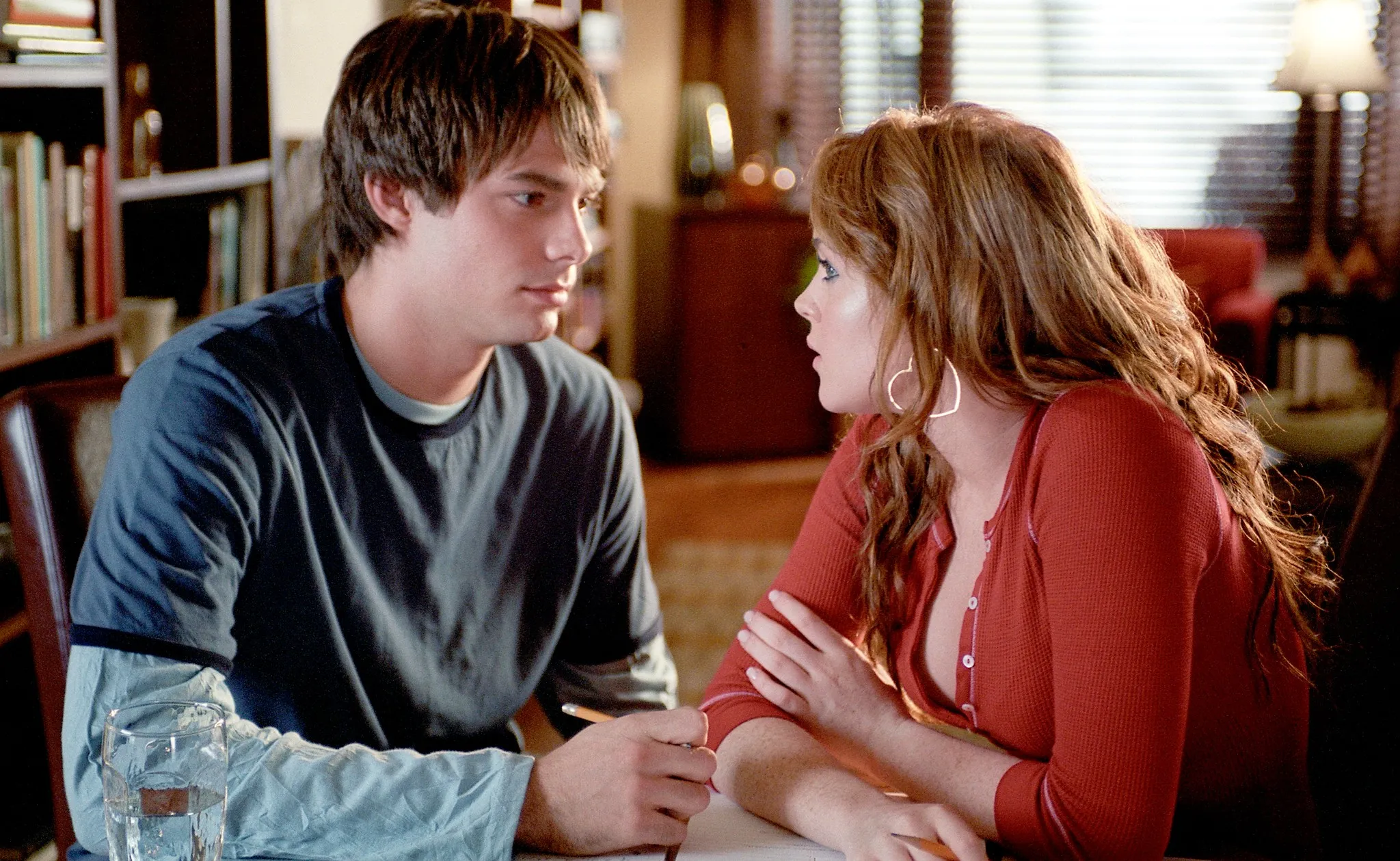 A teenage boy talks to a girl in 'Mean Girls.'
