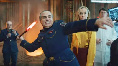 A man throws a spear in 'Mickey 17.'