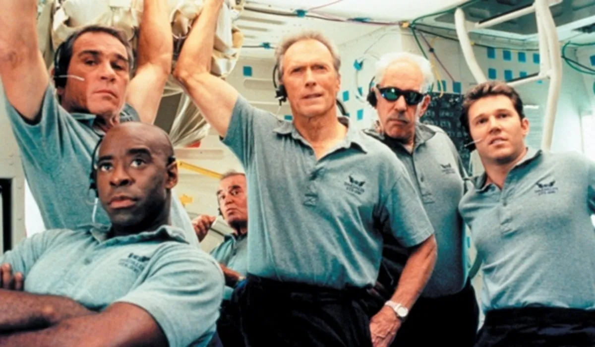 A group of men stand in a space shuttle in 'Space Cowboys.'