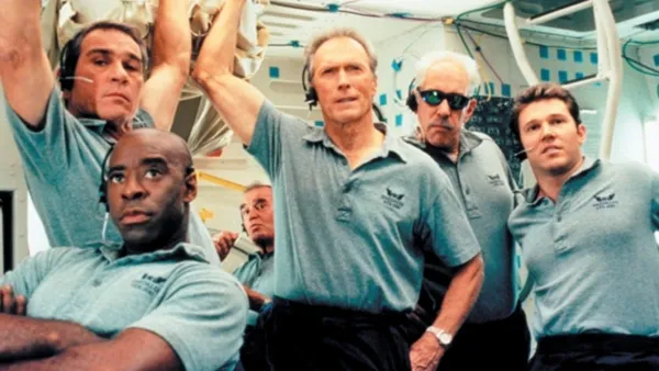 A group of men stand in a space shuttle in 'Space Cowboys.'