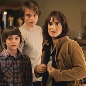 A mother stands with her two sons in 'Stranger Things.'