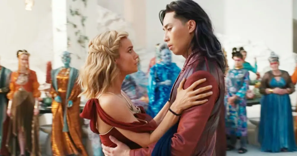 A woman dances with a man in 'The Marvels.'