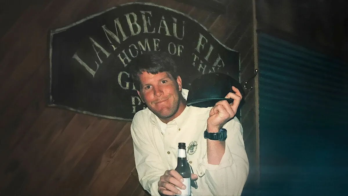 Brett Favre holds a hat in 'Untold: The Fall of Favre.'