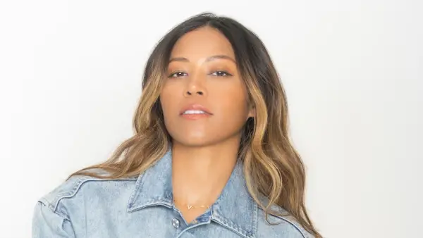 Amerie Book Interview feature AMERIE2025 standing denimRONY ALWIN