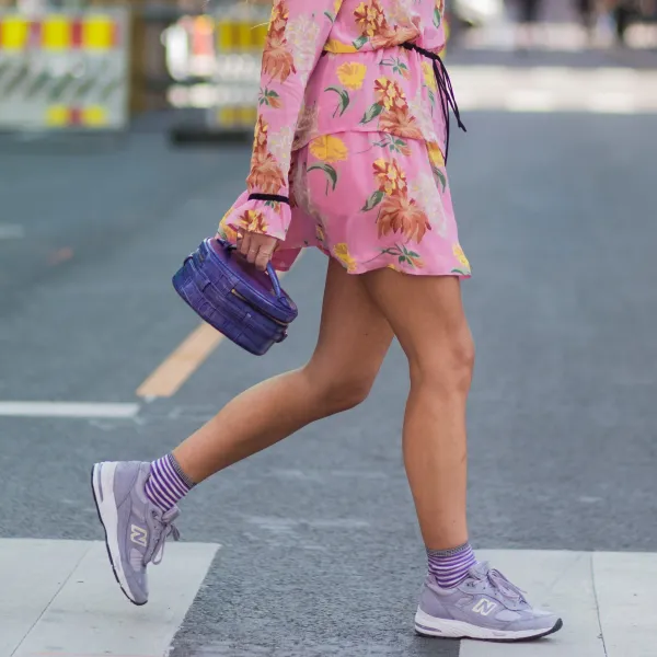 OSLO, NORWAY - AUGUST 22: Emili Sindlev wearing a pink dress with floral print, sneakers, striped socks outside Moods of Norway on August 22, 2017 in Oslo, Norway. (Photo by Christian Vierig/Getty Images)