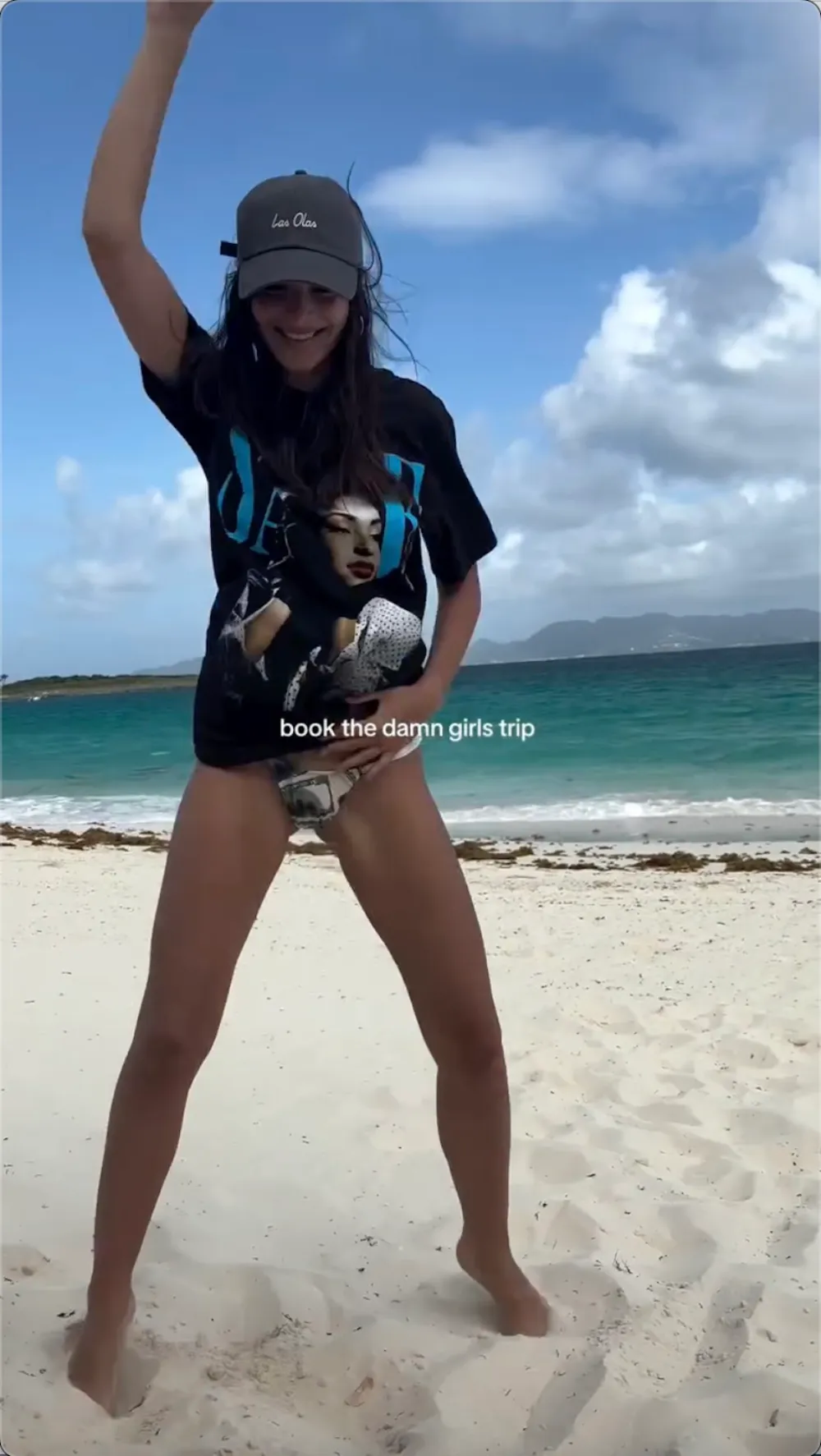 Emily Ratajkowski Shows Off Tiny Bikini Bottoms While Dancing on the Beach