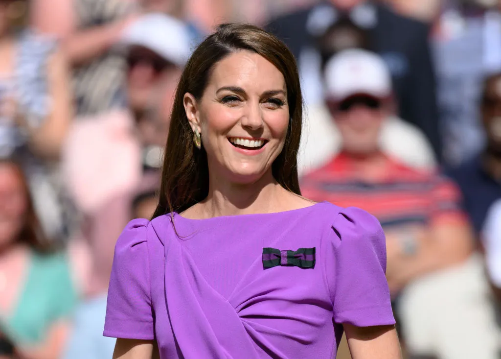 LONDON, ENGLAND - JULY 14: Catherine, Princess of Wales on court to present the trophy to the winner of the men's final on day fourteen of the Wimbledon Tennis Championships at the All England Lawn Tennis and Croquet Club on July 14, 2024 in London, England. (Photo by Karwai Tang/WireImage)