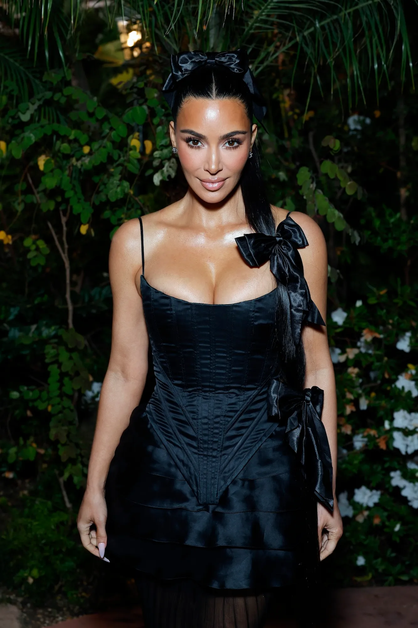 Kim Kardashian Poses Topless in a Risque Bedroom Photoshoot