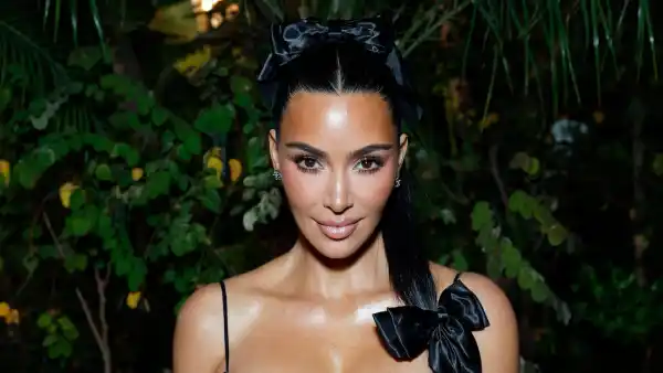 Kim Kardashian Poses Topless in a Risque Bedroom Photoshoot