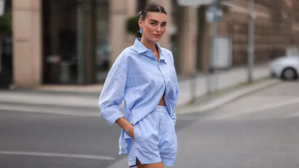 BERLIN, GERMANY - AUGUST 16: Celine Bethmann wearing blue striped Worst Behavior two piece on August 16, 2021 in Berlin, Germany. (Photo by Jeremy Moeller/Getty Images)