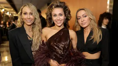 Miley-Cyrus-With-Tish-and-Brandi-GettyImages-1986605735