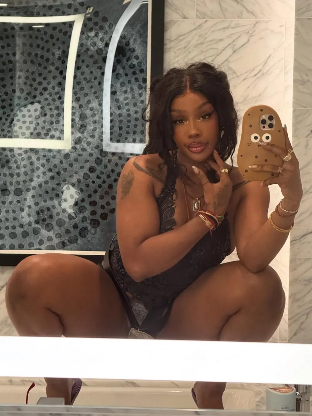 SZA Frees the Nip While Going Braless Underneath Sheer Top &mdash; And Fans Go Wild