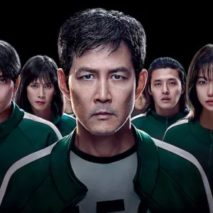 A group of people look at the camera in 'Squid Game' season 3.