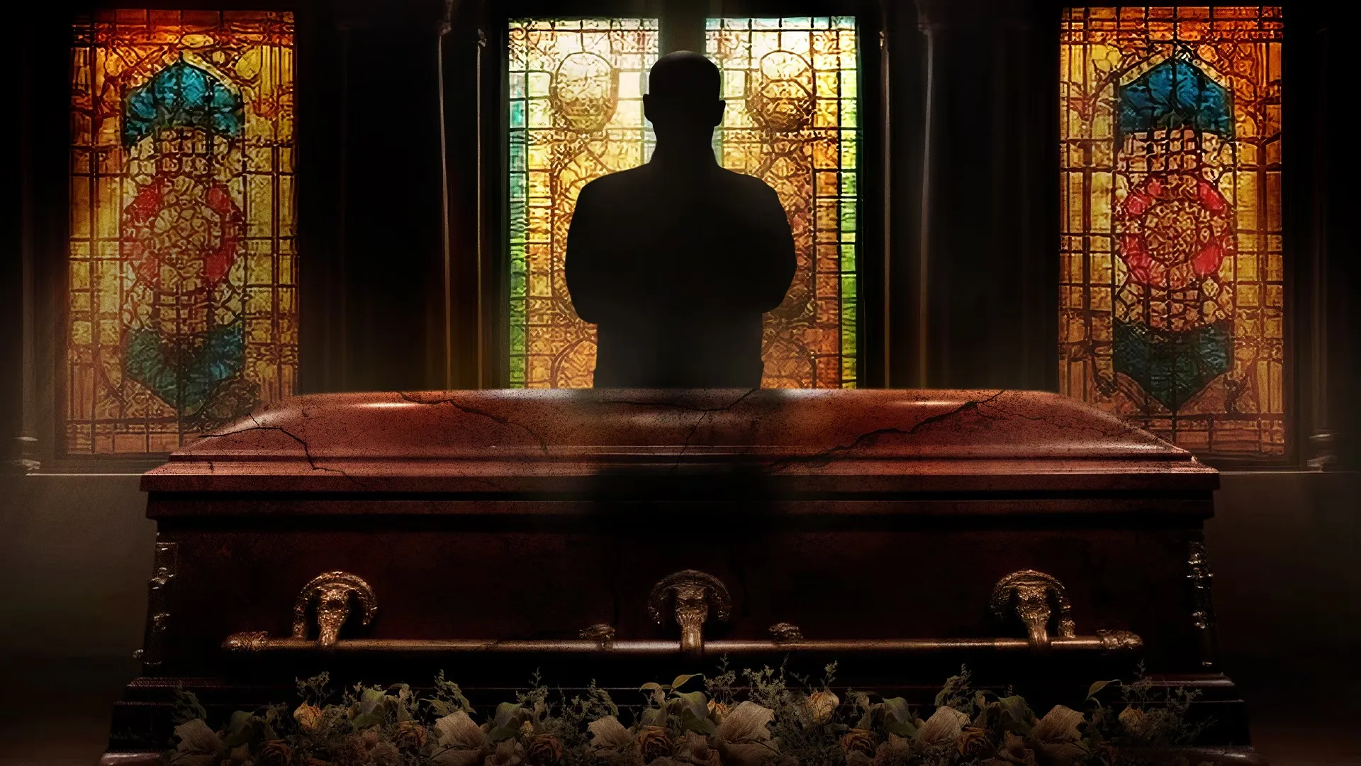 A man stands in front of a window in a funeral home in HBO's The Mortician