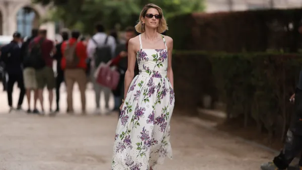 PARIS, FRANCE - JULY 05: Helena Bordon seen outside Elie Saab show wearing black small sunnies, shoulder strap white lace dress with lilac flower details and lilac heels during the Haute Couture Fall/Winter 2023/2024 as part of Paris Fashion Week on July 05, 2023 in Paris, France. (Photo by Jeremy Moeller/Getty Images)