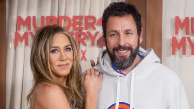 GettyImages-1477687034 Adam Sandler Reacts to Pal Jennifer Aniston and Jim Curtis' Romance