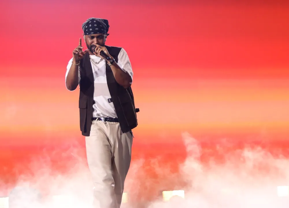 GettyImages-2180931477 Big Sean Morgan Wallen and More Stars Reference CEO Kiss Cam Scandal on Stage.jpg