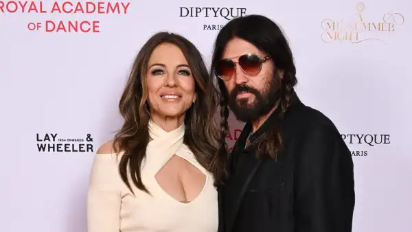 GettyImages 2220449960 Billy Ray Cozies Up With Elizabeth Hurley in London at Daughter Noah Cyrus Concert